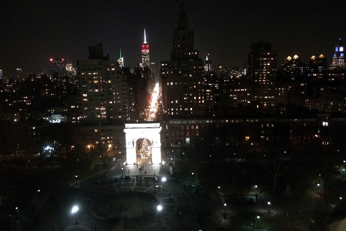 30 New York Washington Square Park With Fifth Avenue And Empire State Building Behind At Night From NYU